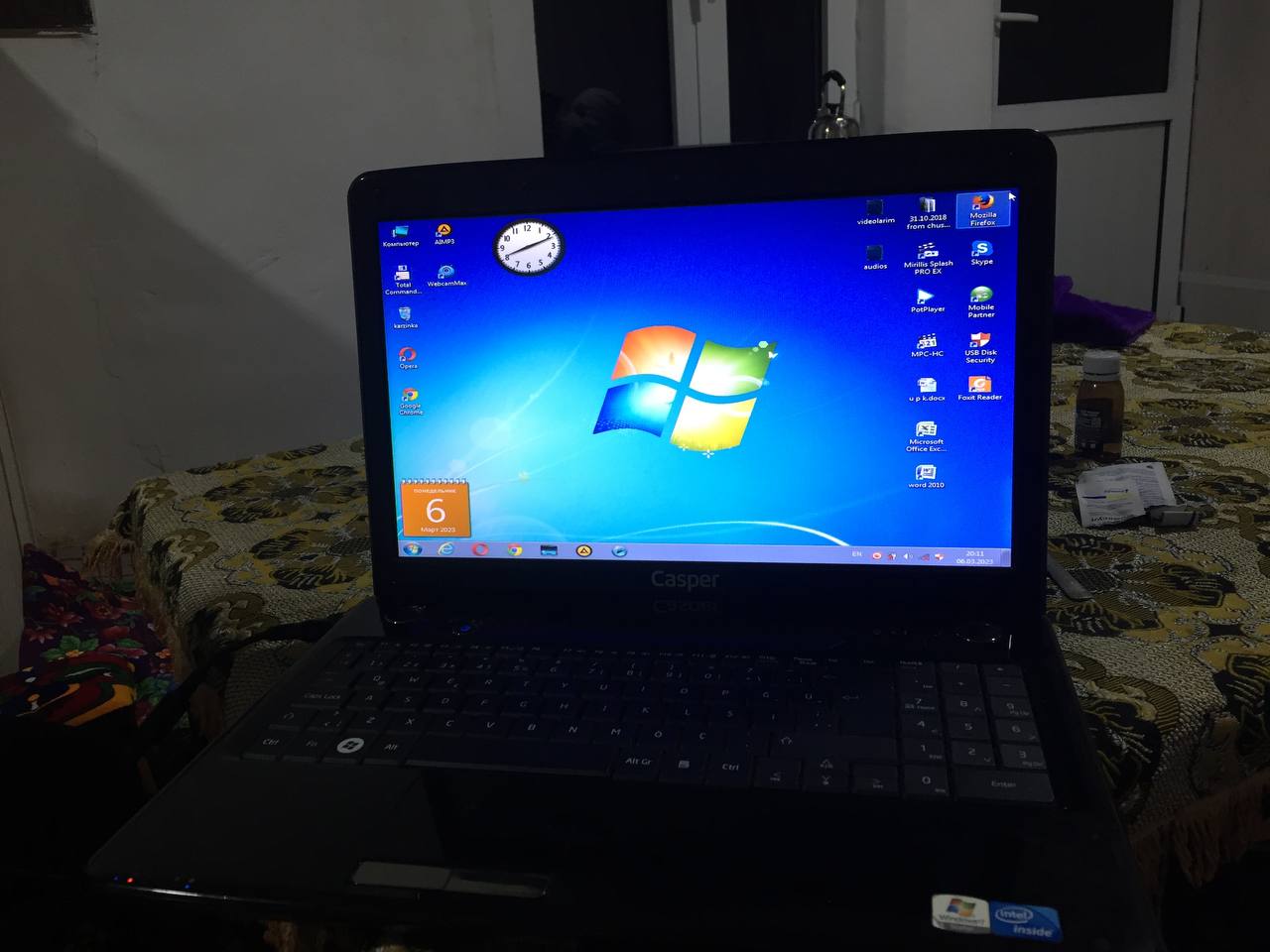 a laptop computer on a bed